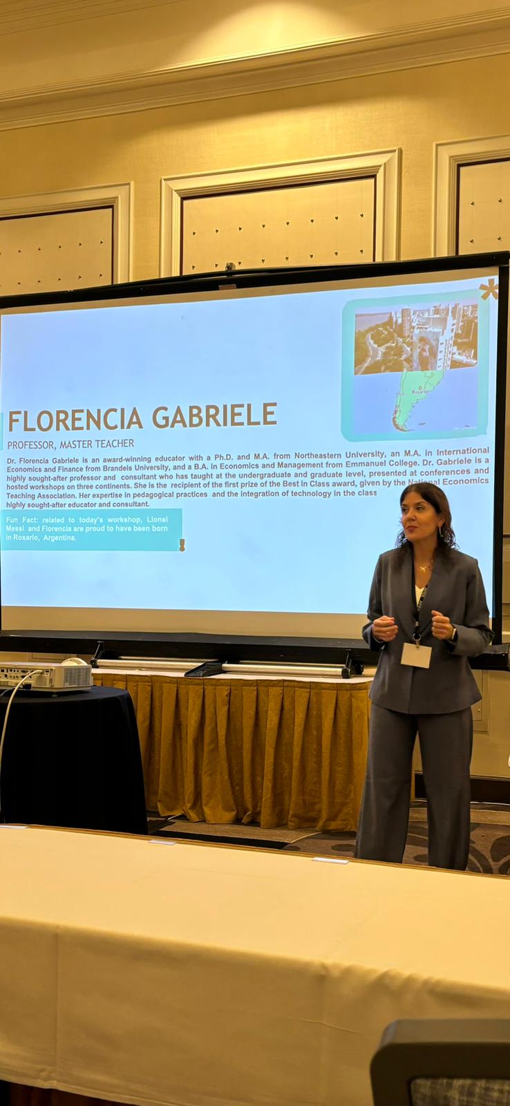 Dr. Florencia Gabriele presenting at a business conference
