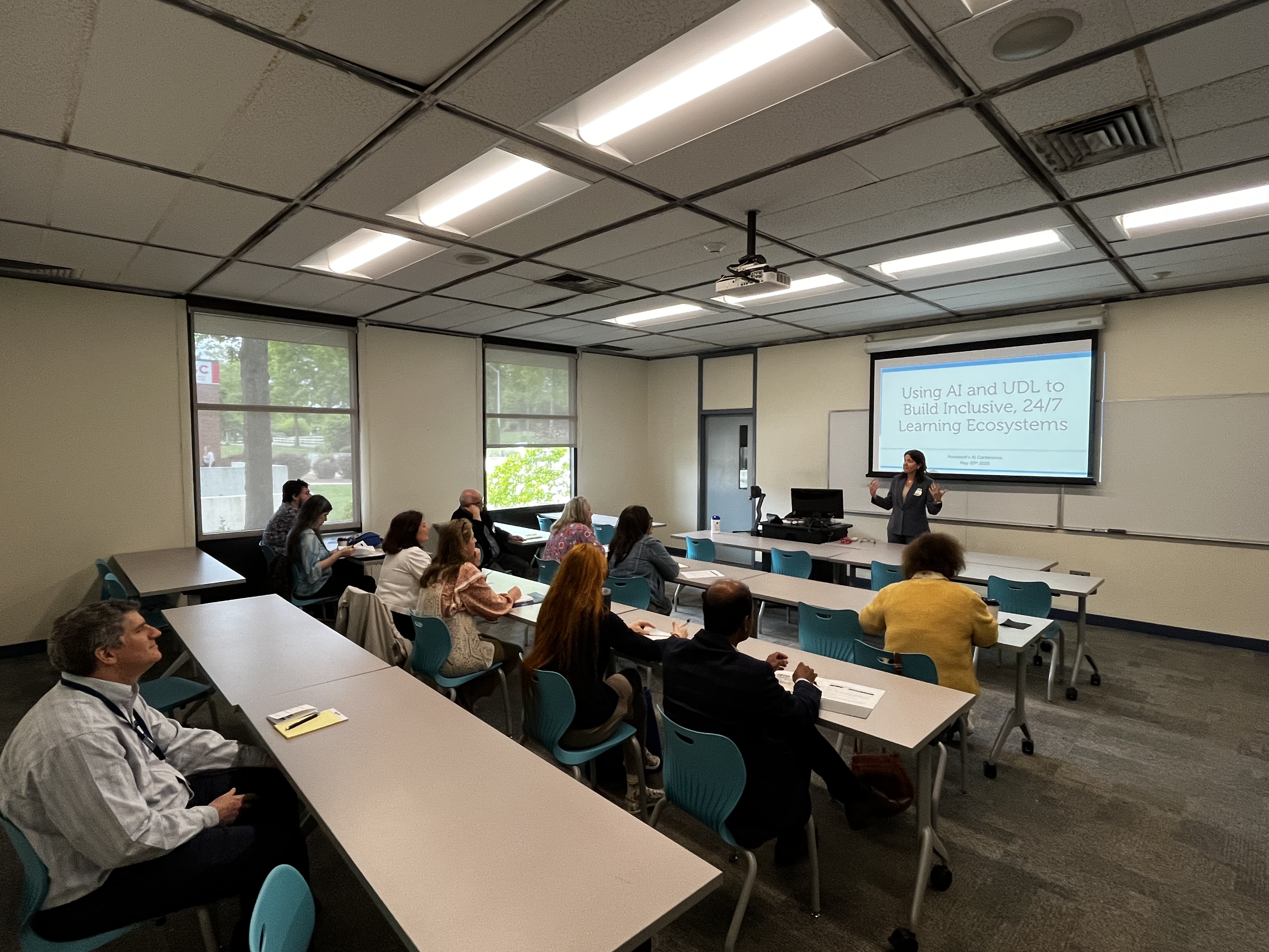 Dr. Gabriele presenting to a packed lecture hall